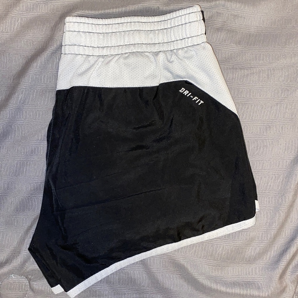 Juniors Nike Dri-Fit Athletic Shorts. Black with silver lining.